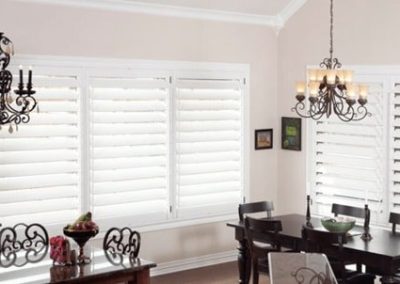 White plantation shutters in kitchen space