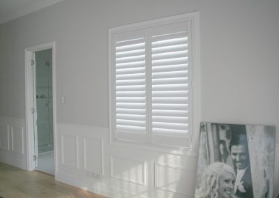 Newly installed plantation shutters in living room